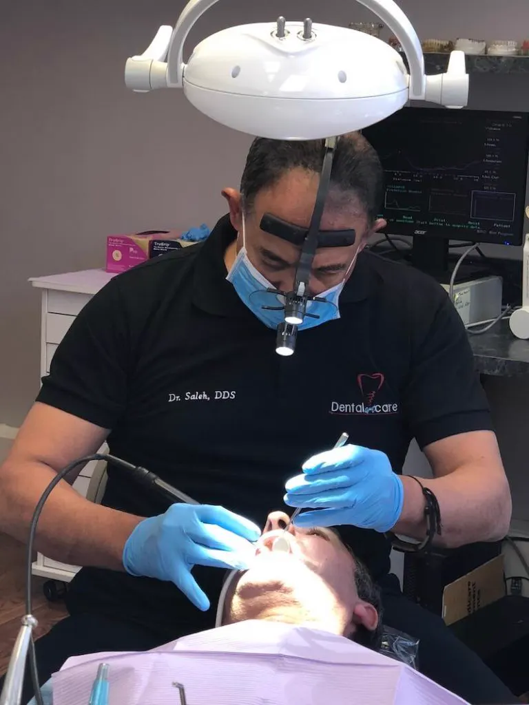 Dr. Saleh Elahwal caring for a patient