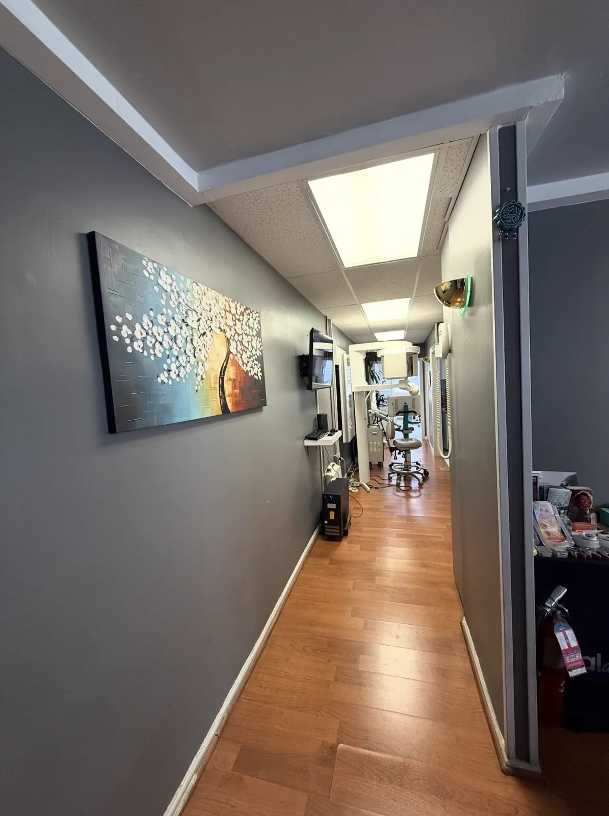 A bright hallway leading to the treatment rooms at Dental Art Care